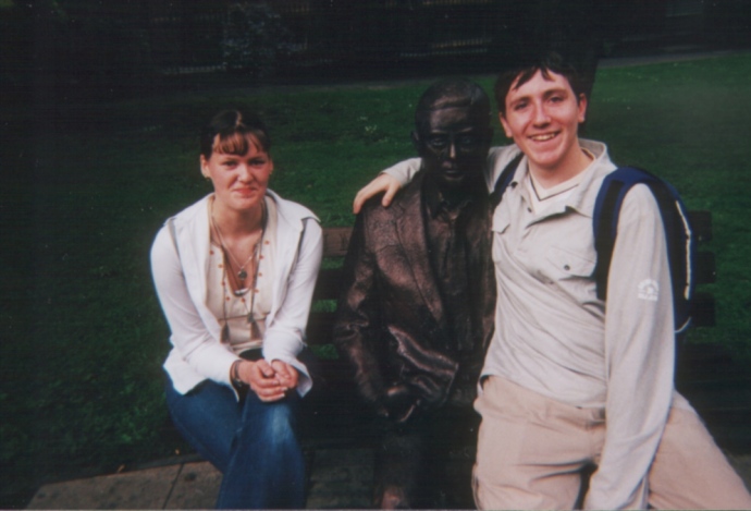Jason Holden with my friend Michelle next to the Alan Turing statue, Manchester
